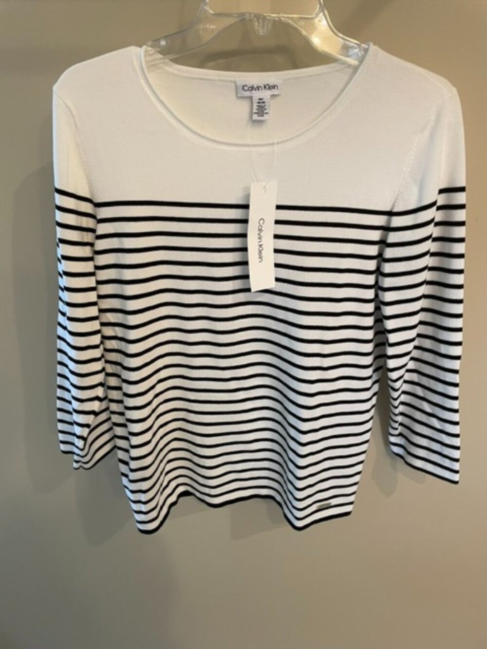 Women's Calvin Klein lightweight striped sweater in black and Ivory.